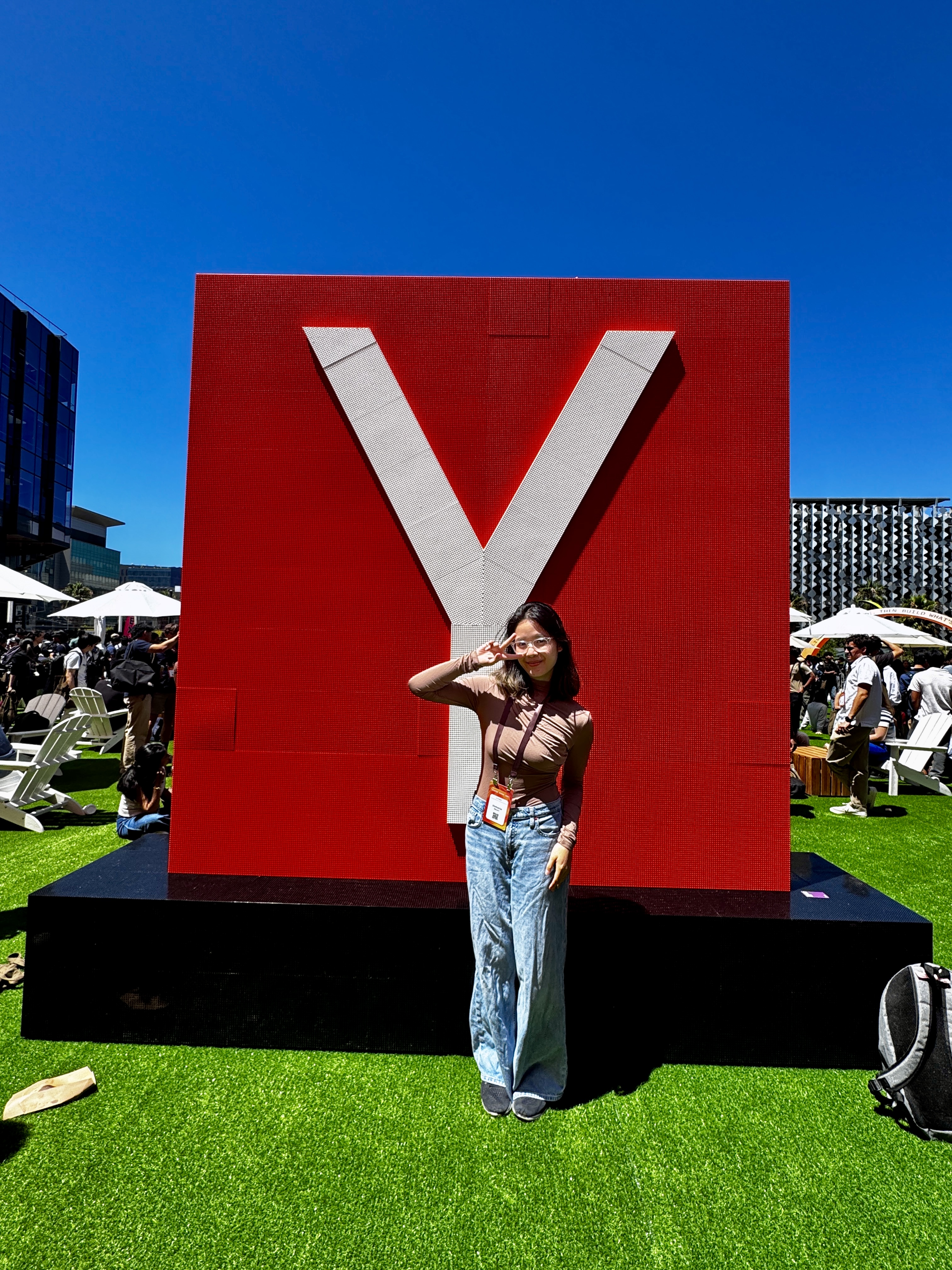 in front of the Y Combinator sign